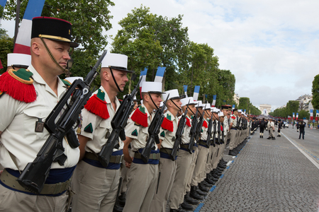 Paris, France - July 14, 2012. Soldiers from the French Foreign Legion march during the annual military parade in honor of the Bastille Day in Paris.のeditorial素材