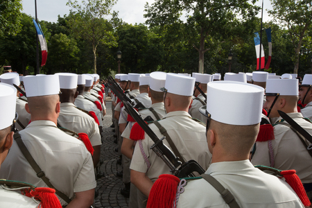 Paris, France - July 14, 2012. Soldiers from the French Foreign Legion march during the annual military parade in honor of the Bastille Day in Paris.のeditorial素材