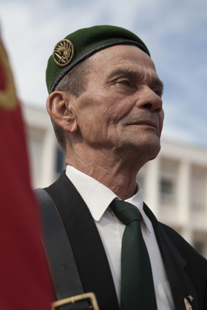 Aubagne, France. May 11, 2012. Portrait of a veteran of the French foreign legion with the banner of veterans .のeditorial素材