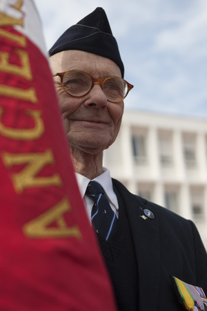 Aubagne, France. May 11, 2012. Portrait of a veteran of the French foreign legion with the banner of veterans .のeditorial素材
