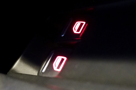 Switch in car at nightの写真素材