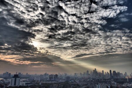 Shine from the blue sky to townの写真素材