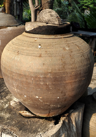 Old earthen jar in Thailandの写真素材