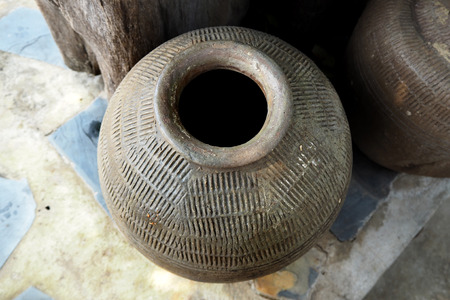 Old earthen jar in Thailandの写真素材