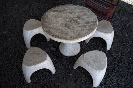 Stone table set for dinner