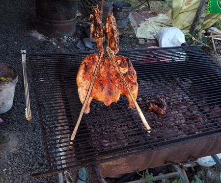 Chicken grill on the stoveの写真素材