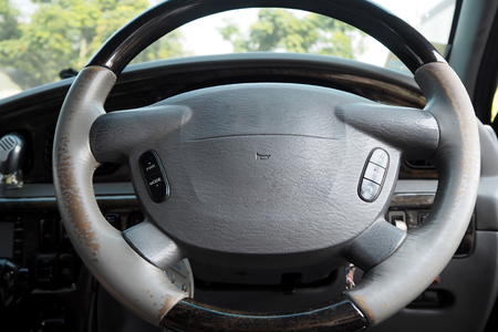 car steering made from wood and leather very beautifulの写真素材