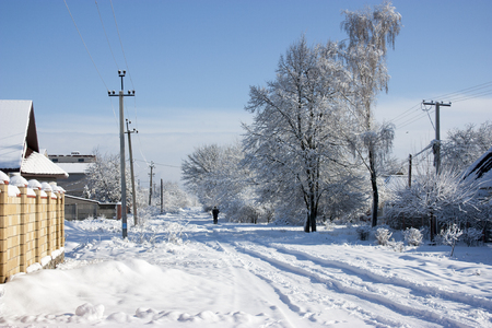 Winter street in the snow, a sunny winter day, at homeの写真素材