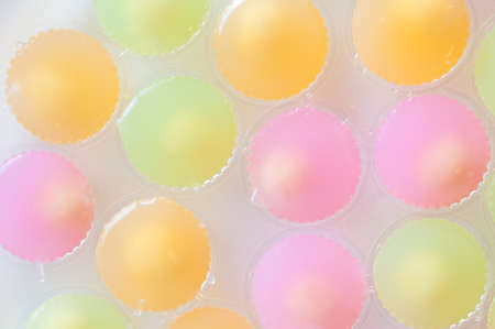 Fruit Shaped Mung Beans in Jelly close up in white foam dish, Wun Look Choup Thai sweetsの写真素材
