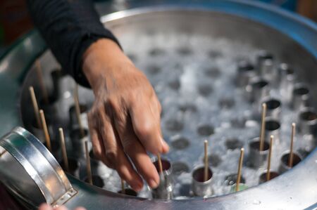 Machine tank made ice cream stick with sparkling water in street food market  thailand