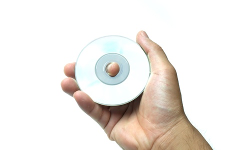 Hand holding the digital Video Disc.の写真素材