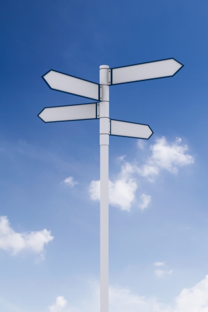 Direction road signs on blue sky.の写真素材