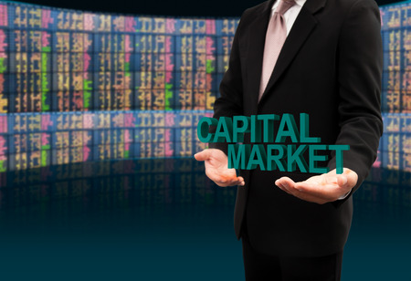 Capital market text on hands businessman.の写真素材