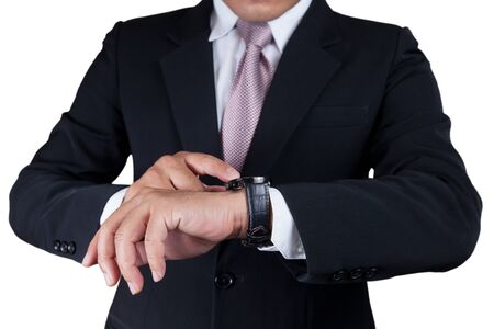 Businessman with wrist watch isolated on white.の写真素材