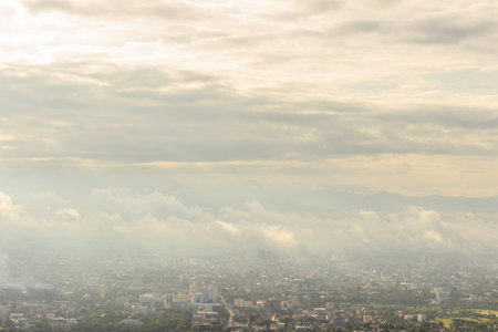 Strong light from the sun is projected through the cityの写真素材