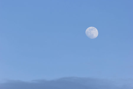 Beautiful moon on the blue sky, abstract backgroundの写真素材