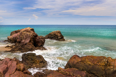 Wave and rocky on the beach at Kao Nayak, Phangnga Province, Thailandの写真素材