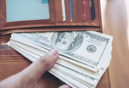 US dollar money banknote in full walletの写真素材