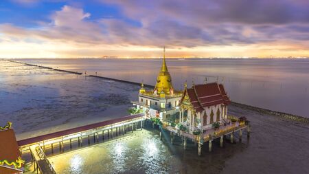 beautiful sunset  top view  thai temple on the sea , landscape thailand