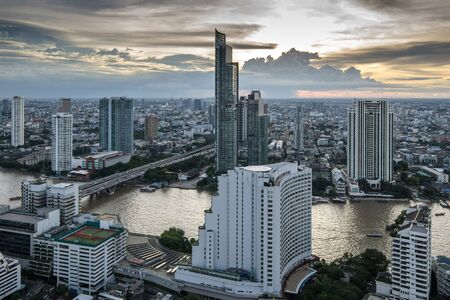 Bangkok City - Aerial view  Chao Phraya River Bangkok city urban downtown skyline of Thailand ,...