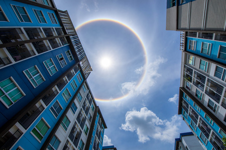 sun corona rainbow clouds and blue sky background , Circumscribed haloの写真素材