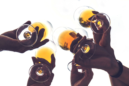 friends celebrating and drinking glasses with champagne at party  champagne toast on Partyの写真素材