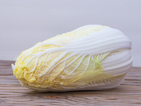Fresh  chinese cabbage on wood background.の写真素材