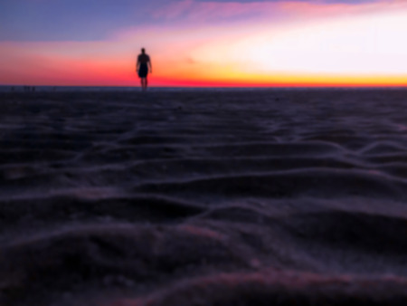 Blurred silhouette Man standinding on the beach with sunset background at Puerto Penasco (Rocky Point) Mexico.の写真素材