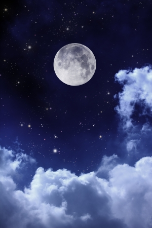 cloudy night sky with moon and starの写真素材