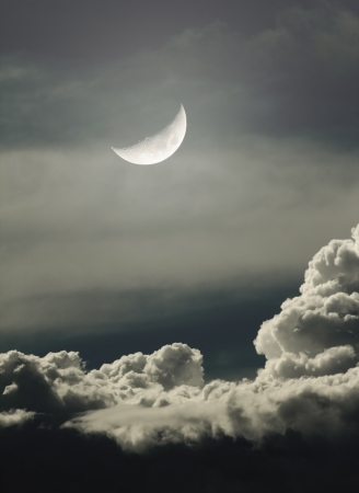 night sky with moon and cloudsの写真素材
