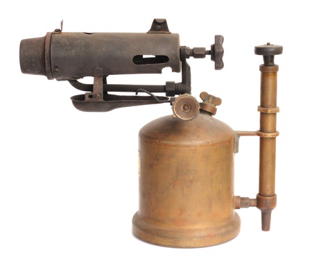 antique blowtorch isolated on white backgroundの写真素材