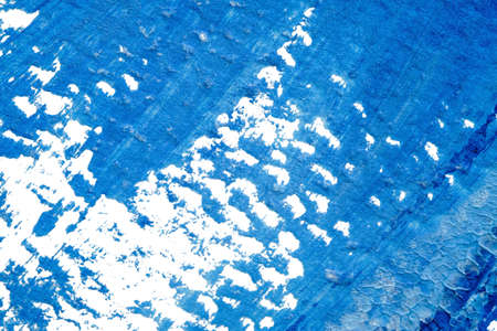 blue abstract acrylic painting color texture on white paper background by using rorschach inkblot...