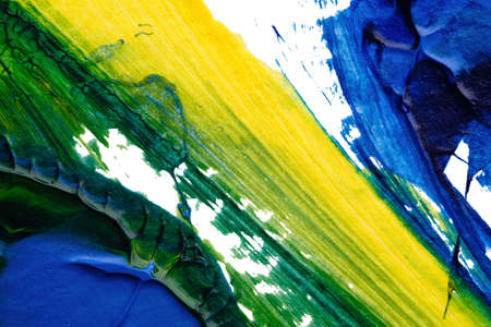 blue green yellow abstract acrylic painting color texture on white paper background by using...