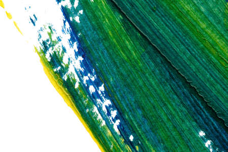 blue green yellow abstract acrylic painting color texture on white paper background by using rorschach inkblot methodの写真素材