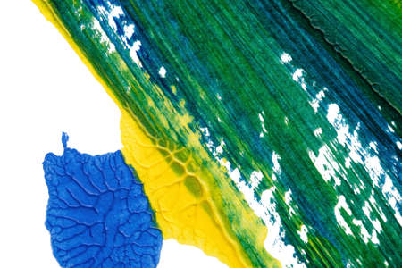 blue green yellow abstract acrylic painting color texture on white paper background by using rorschach inkblot methodの写真素材