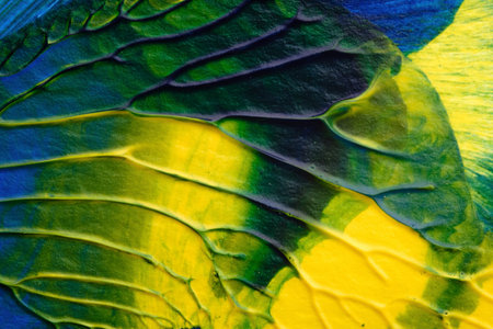 blue green yellow abstract acrylic painting color texture on white paper background by using rorschach inkblot methodの写真素材