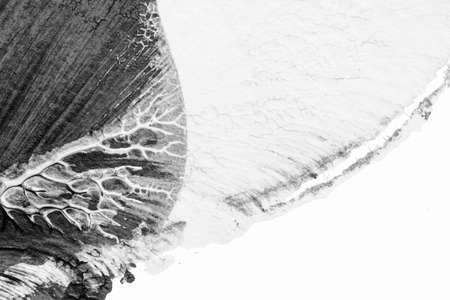 black white abstract acrylic painting color texture on white paper background by using rorschach inkblot methodの写真素材