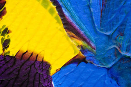 blue purple red yellow abstract acrylic painting color texture on white background by using inkblot methodの写真素材