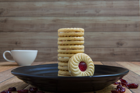 Cranberry filled cookies for tea break during a meeting.の写真素材