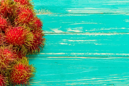 Tropical Fruit on Wooden Backgroundの写真素材
