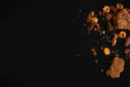 Cookie Crumbs on Black Backgroundの写真素材