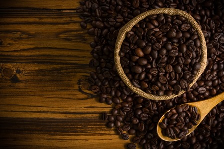 Coffee Beans on Wooden Backgroundの写真素材