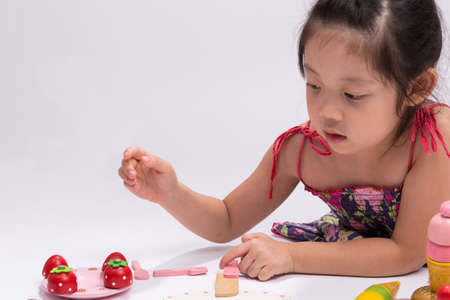 Child Playing Cooking Toy Set, Isolatedの写真素材
