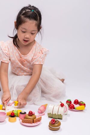 Kid Playing Cooking Toy Set, Isolatedの写真素材