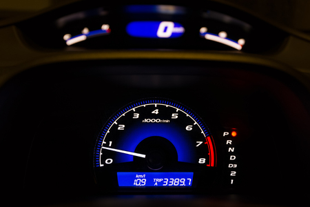 Car Dashboard with Illuminated Tachometer and Speedometer, HDRの写真素材