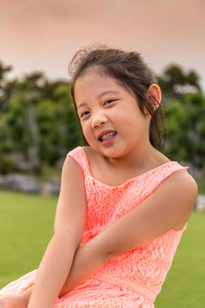 Asian Child Portrait Outdoor at Sunsetの写真素材