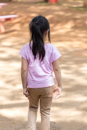 Lonely Child in Playground from Back Viewの写真素材
