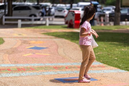Child Walking in Parkの写真素材