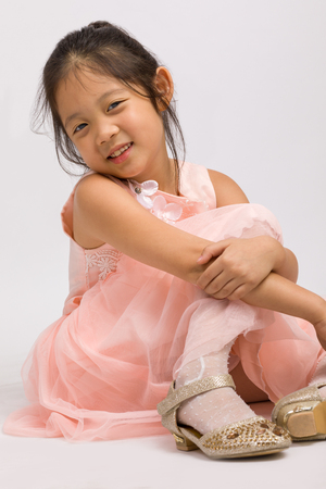 Kid in Pink Dress, Isolated on Whiteの写真素材