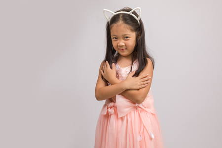 Child with Cat Ear Headband, Isolated on Whiteの写真素材
